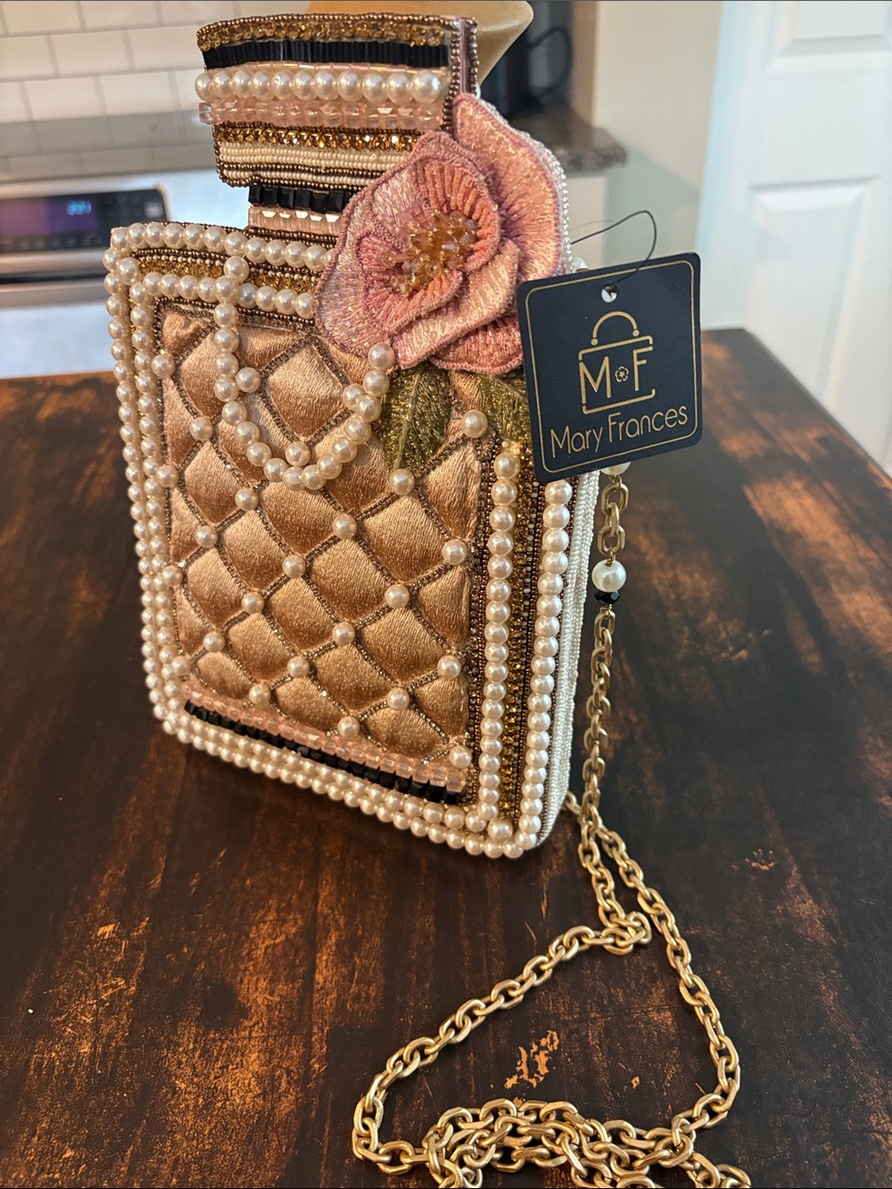 Mary Frances Rose Gold Quilted Pearl-Embellished Crossbody Clutch